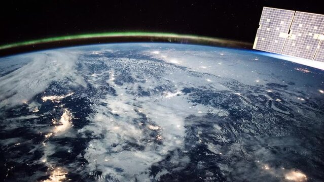 FLying over planet Earth. Beautiful clouds and atmosphere of Earth. View from International Space Station. Public Domain images from Nasa	
