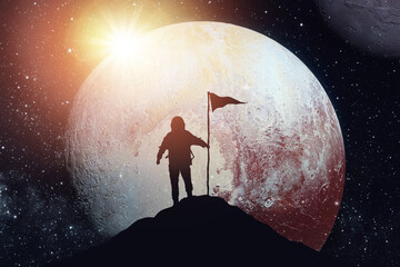 Silhouette of an astronaut with a flag against the backdrop of a planet and a shining star....