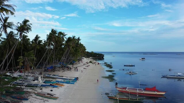 Siquijor Island and boats on the sandy beach , Asia, Philippines, Bohol Island, Panglao, in summer on a sunny day.