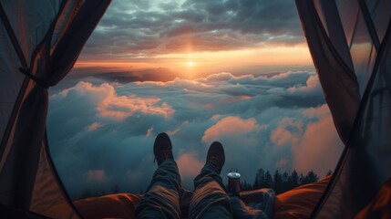 A person sitting in a tent looking out at the clouds - obrazy, fototapety, plakaty