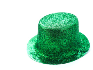 Green Irish hat with glitter on white background. Celebrating Saint Patrick day concept. Love Ireland theme.