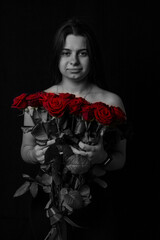 Portrait of a girl with red roses