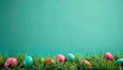 Papier Peint photo Corail vert Easter background, colored easter eggs lying in the grass, field flowers, easter flowers background, fresh green spring Easter background with painted eggs on a green grass