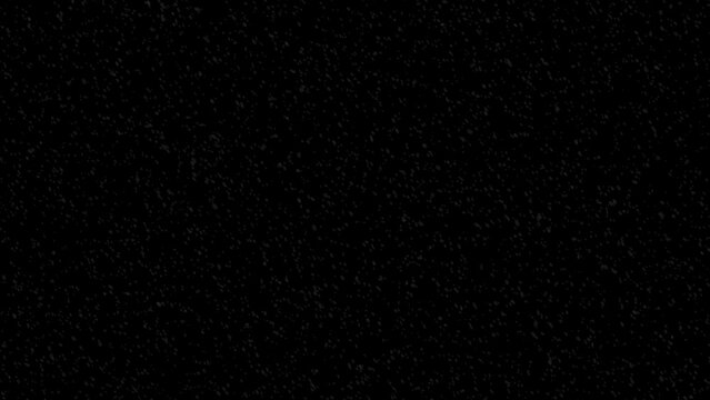 Animation of white snow falling down on black background, ready for video editing element. 