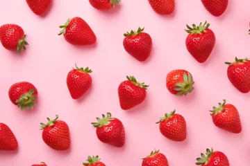 Foto op Aluminium Pattern made of strawberries in perfect symmetry against pink background © Pastel King
