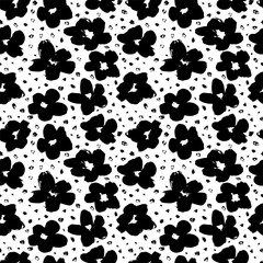 Fototapeta premium Black abstract flowers vector seamless pattern. Botanical ink illustration with floral motif. Daisy or chamomile painted by brush. Hand drawn for fabric, wrapping paper, wallpaper design