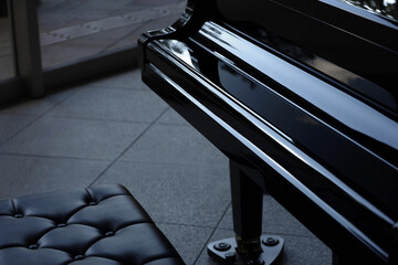A street piano placed in a quiet place with no one around