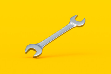 Falling spanner on yellow background. Metal wrench in workshop. Repair and maintenance tool. 3d render