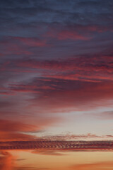 Violet yellow sunset. A variety of clouds. Romantic sky. Universal vertical photo. The background...