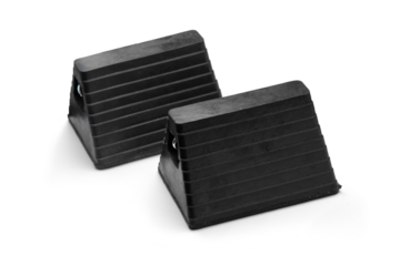 Heavy-Duty Industrial Rubber Wheel Chocks Set for Secure Vehicle Stabilization - Durable and Weather-Resistant for Trucks, Trailers, and Equipment Isolated with transparent shadow