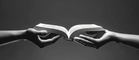Close up monochrome black and white style of two hands open book for education concept. AI generated