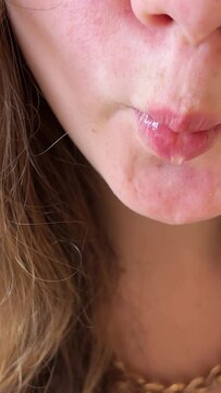 A young girl eats delicious pho bo soup with chicken in Vietnam in the mall fast cooking cheap food healthy traditional Vietnamese soup in Ho Chi Minh City. Saigon