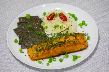 Salmon fish grilled in butter and olive oil