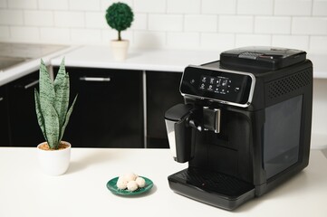 Modern coffee machine in kitchen
