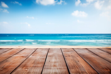 A wooden deck in the foreground with a clear view of the tranquil blue ocean and horizon.