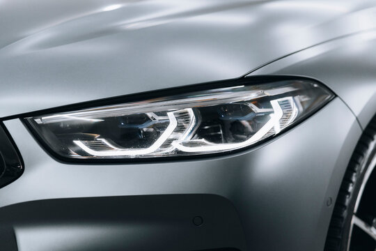 Photo of BMW G14 G15 G16 8 Series. They show details of the car with an electronic display, steering wheel, performance seats, lights and the car.
