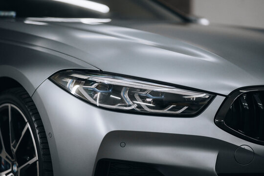 Photo of BMW G14 G15 G16 8 Series. They show details of the car with an electronic display, steering wheel, performance seats, lights and the car.