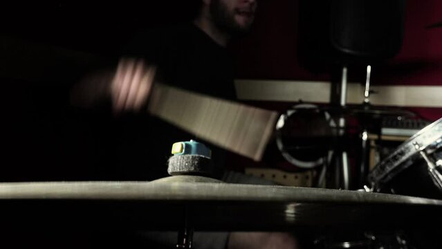 extreme close up footage of a ride cymbal while drummer playing