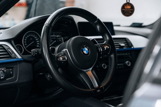 Photo of BMW F30 3 Series. They show details of the car with the odometer, steering wheel, performance seats with Alcantara, lights and the car.