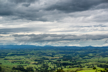 Stunning scenery in Northern New South Wales, Australia, featuring rolling hills, lush farmlands,...