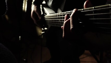 Man lead guitarist playing electrical guitar - Powered by Adobe