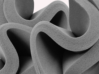 curved sheets of sponge foam. black or dark gray material isolated on white background