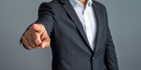 Unrecognizable Businessman pointing his finger at the camera, panorama