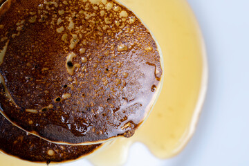 delicious homemade hot pancakes with honey