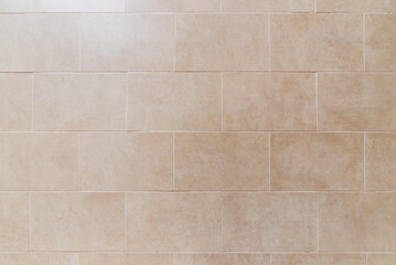 Cream colored tiles background. Vector tile texture