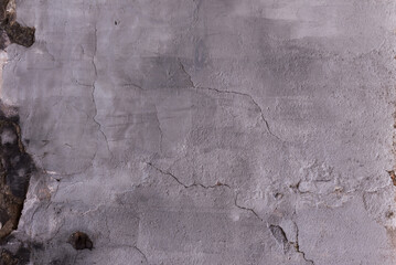 A wall of gray paint with cracks and chips. Vector cement texture background - obrazy, fototapety, plakaty