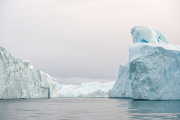 Massive icebergs at the edge of the Icefjord, Illulisat, Greenland.