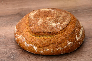 appetizing homemade whole grain bread on a wooden table 3