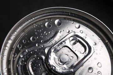 Energy drink in wet can, closeup. Functional beverage