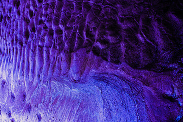 Moonlit Waters: Damp Sands at Night