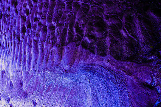 Moonlit Waters: Damp Sands at Night