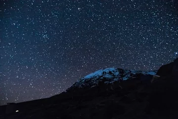 Fototapete Kilimandscharo Starry Night Over the Snow-Capped Peak of Mt. Kilimanjaro