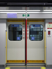 Jakarta, Indonesia - May 31st 2022 - Train doors that provide access for train passengers in and...