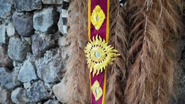 Traditional Leak Rangda Mask costume for a Bali Dance theater performance. Handcrafted masks in the form of legendary demons in Bali, Indonesia.