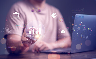 Asset management concept, Businessman using laptop and touch asset management Icon  on virtual...