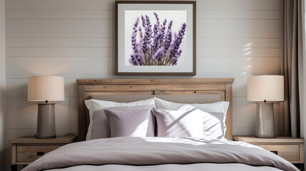 A modern farmhouse bedroom with shiplap walls showcasing rustic artwork and a bouquet of lavender on the nightstand.