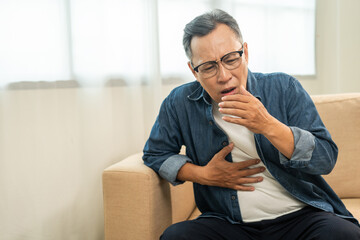 Old man senior have throat irritation mucus and coughing. Fever headache respiratory tract...