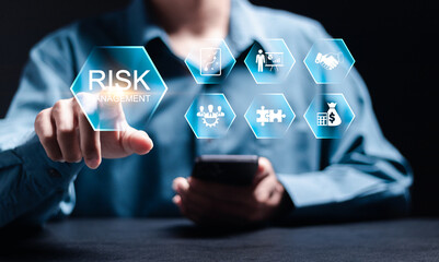 Risk management concept. Risk control and management strategies for risky businesses. Businessman use smartphone with Risk analysis in business decisions.