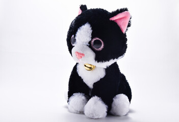 Adorable stuffed cat isolated white background
