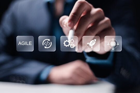 Agile development methodology concept, iterative methods. reducing step by step work and focusing on team. Businessman touching Agile software development principle on virtual screen.