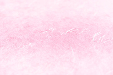 雲龍模様のピンク色の和紙のアップ