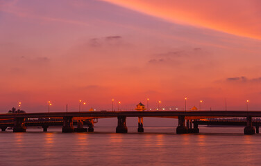 Fototapeta na wymiar scenery sunset at Sarasin bridge. the bridge is the most important in making businesses .from outside to Phuket has traded a lot of money. .This bridge linking the province of Phang Nga..