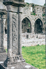 Jerpoint Abbey tipperary Ireland ancient cloister sculptures unique depicting saints and ornamentation, irregular, worn, and decayed, but restored 