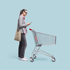 Woman standing behind a trolley