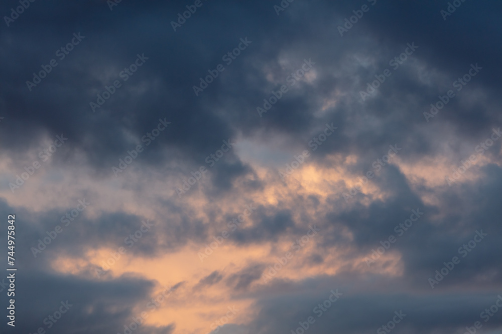 Wall mural colorful clouds at sunrise. background