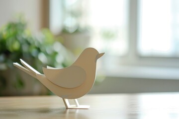 paper cut of bird on the table